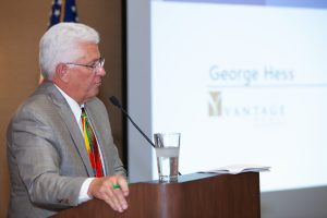 George Hess speaking at an event