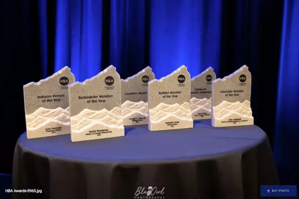 Table with awards for 2021 Awards Ceremony held in April 2022