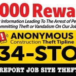 Crimestopper sign offering $1000 reward for tips on construction jobsite thefts.